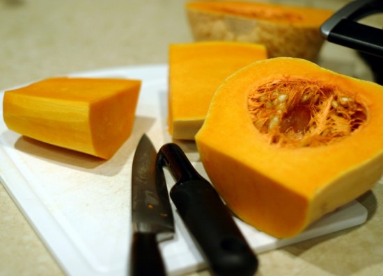 Slicing a butternut squash Slicing a butternut squash
