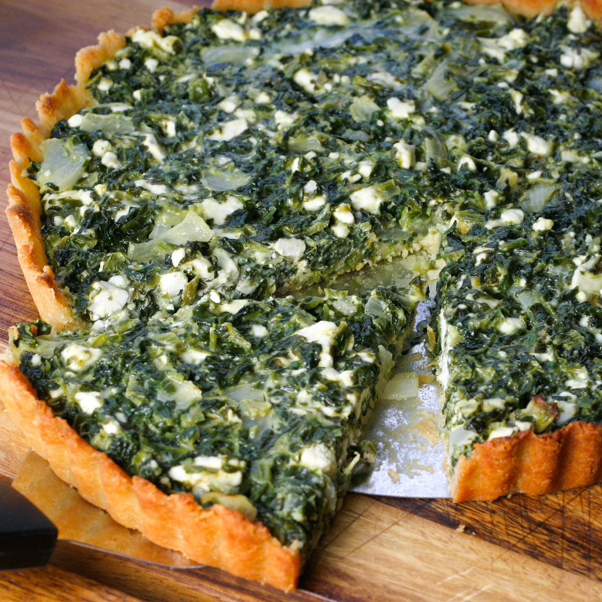 Spinach tart with slice