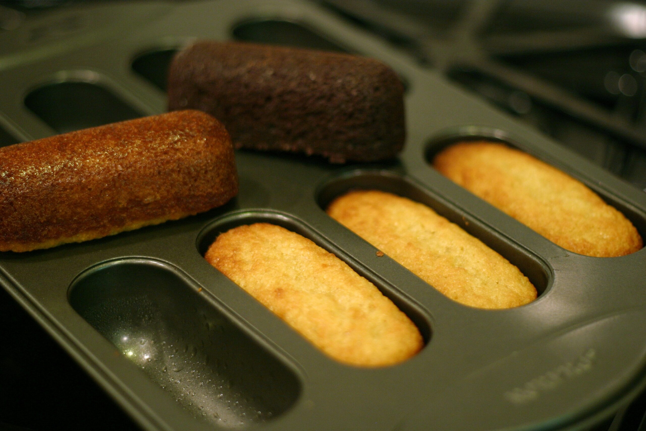 Cream cakes in baking pan