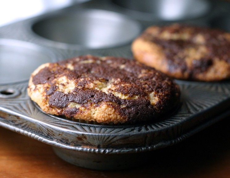 Cinnamon bun muffin in tin