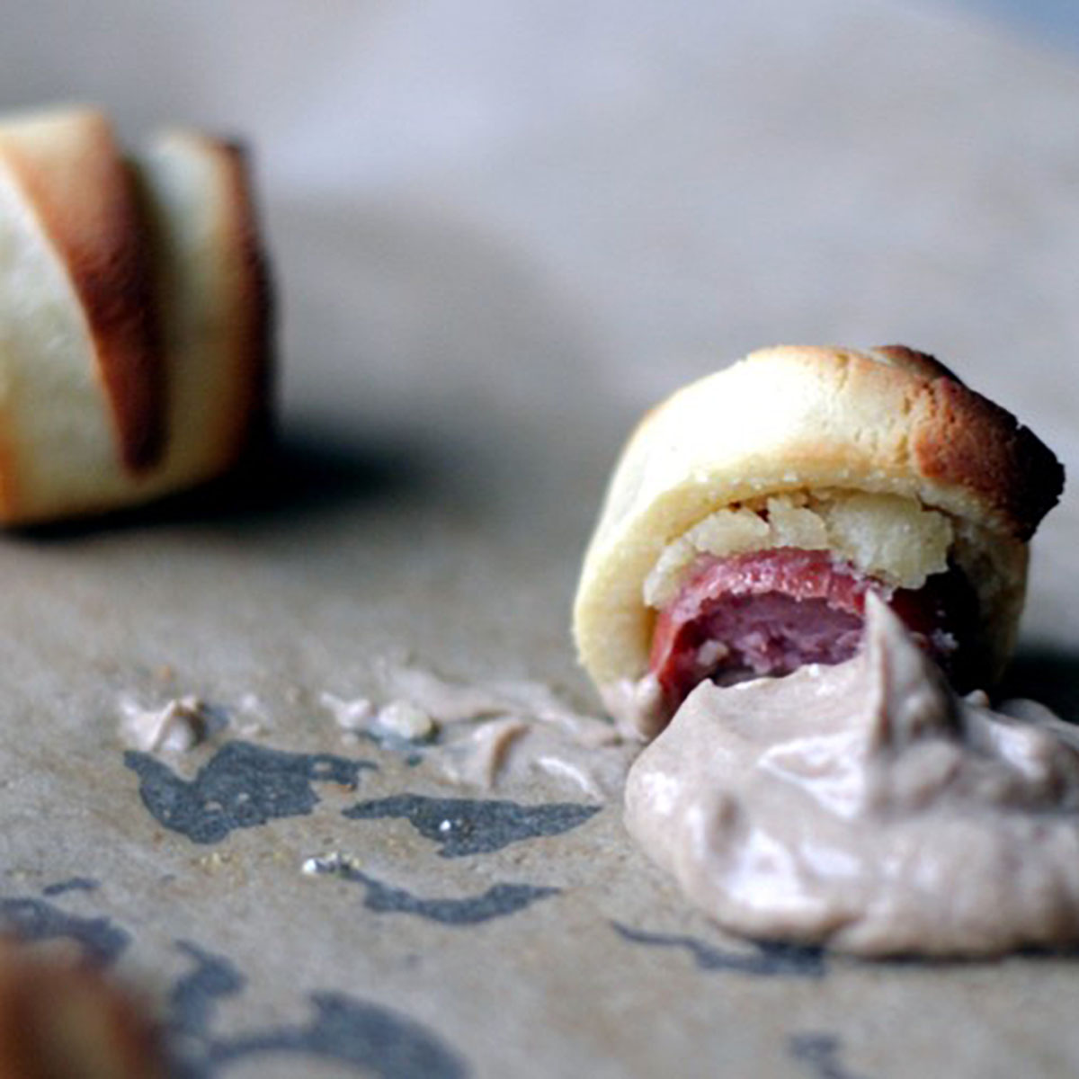 Pigs in a blanket with mustard