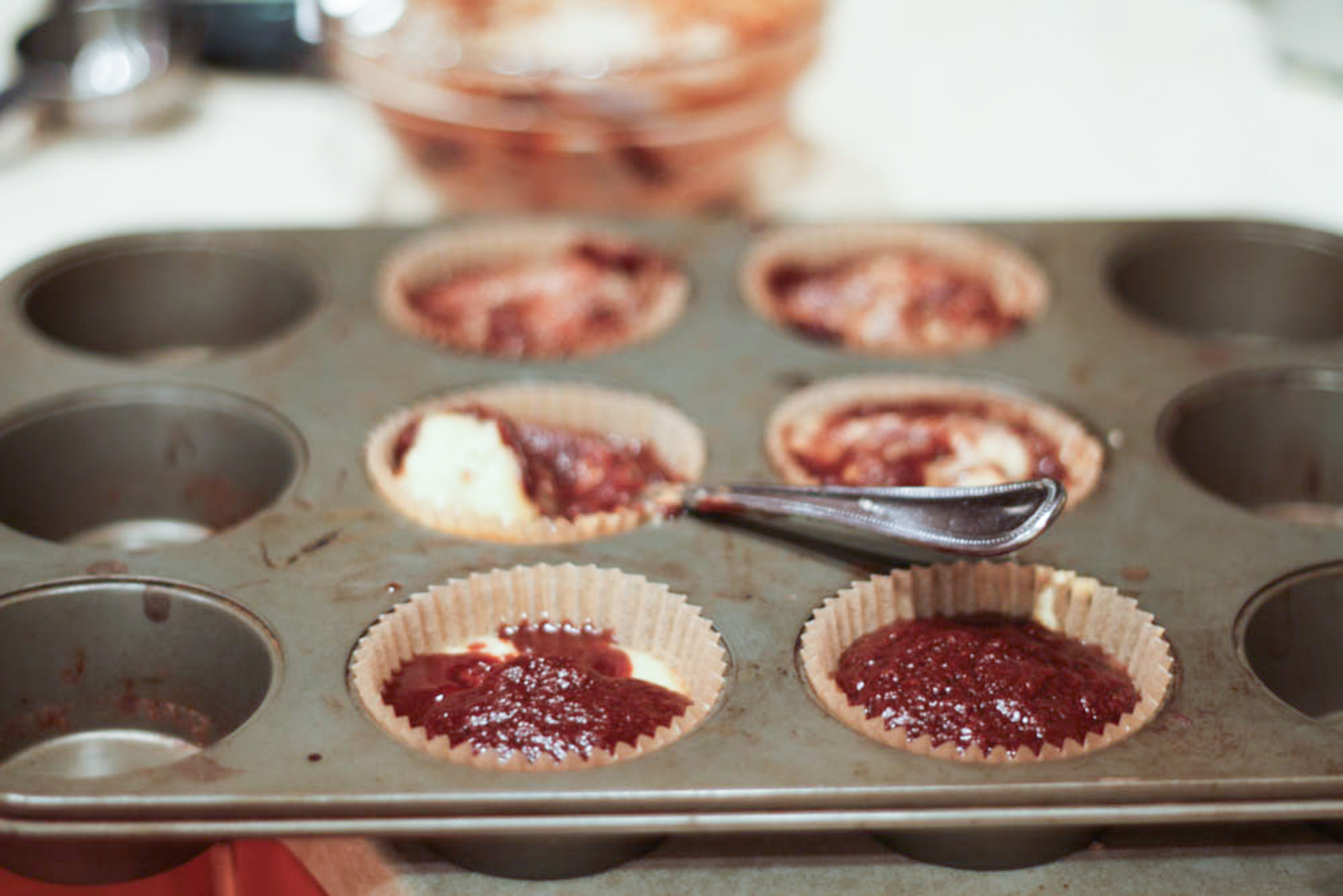 Cinnamon Bun Muffins prepped in muffin pan