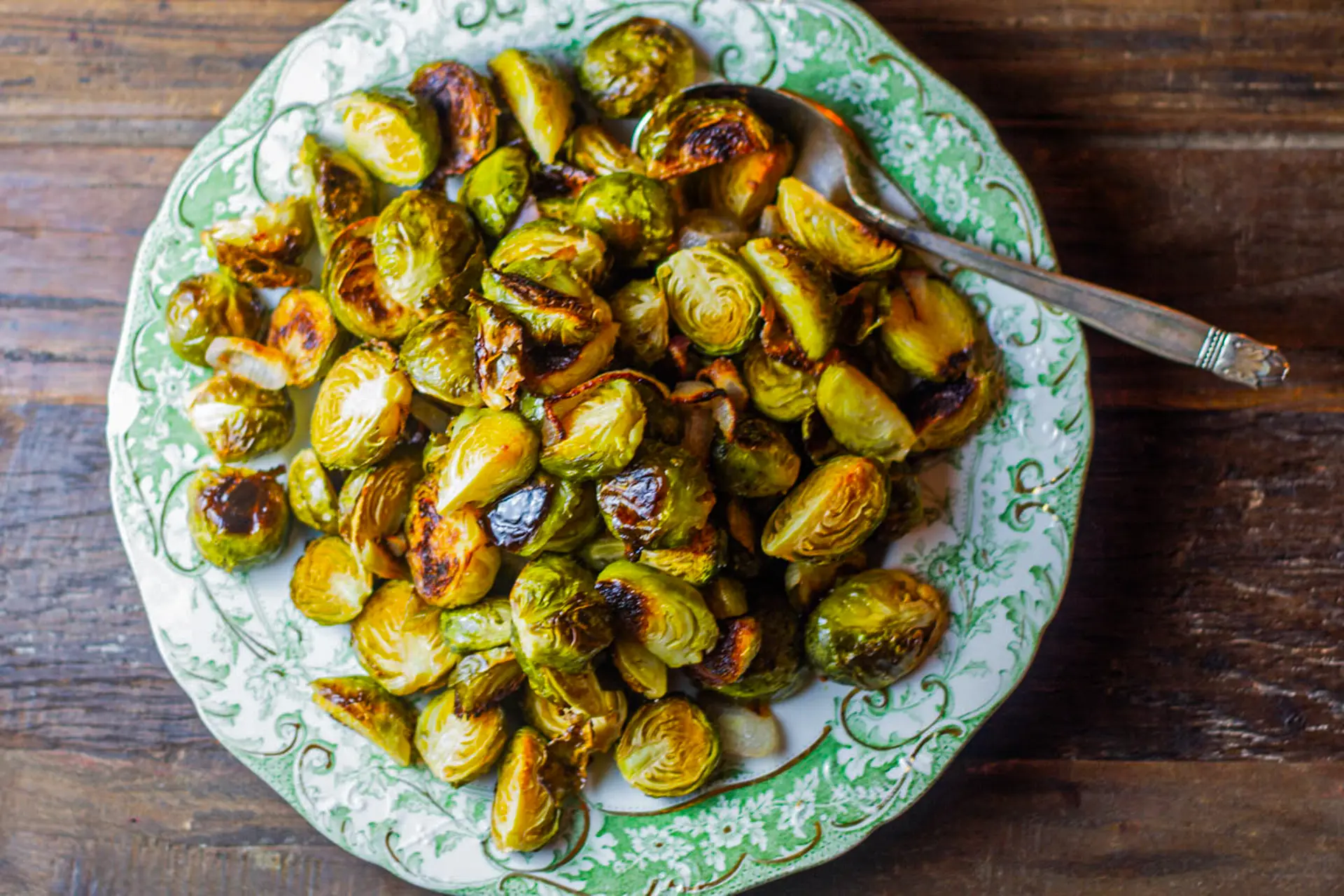 Crispy Brussel Sprouts on plate with spoon