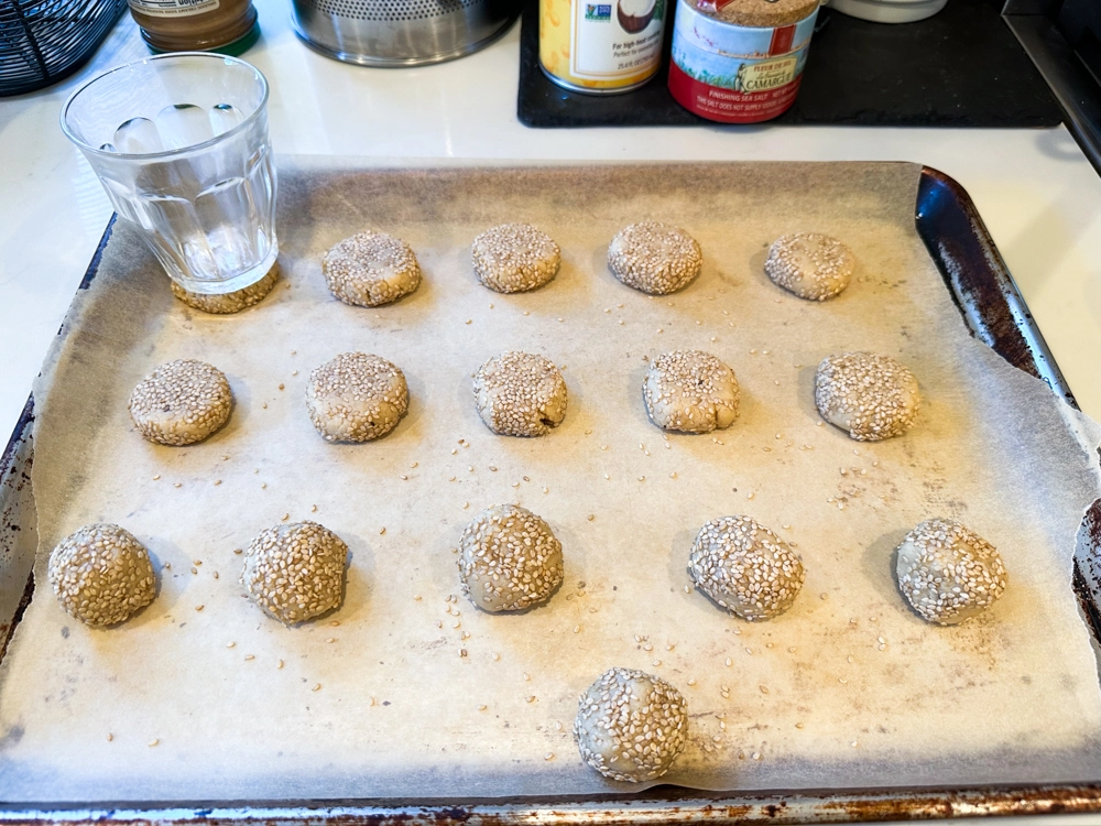 Tahini Cookies pressed on baking sheet image