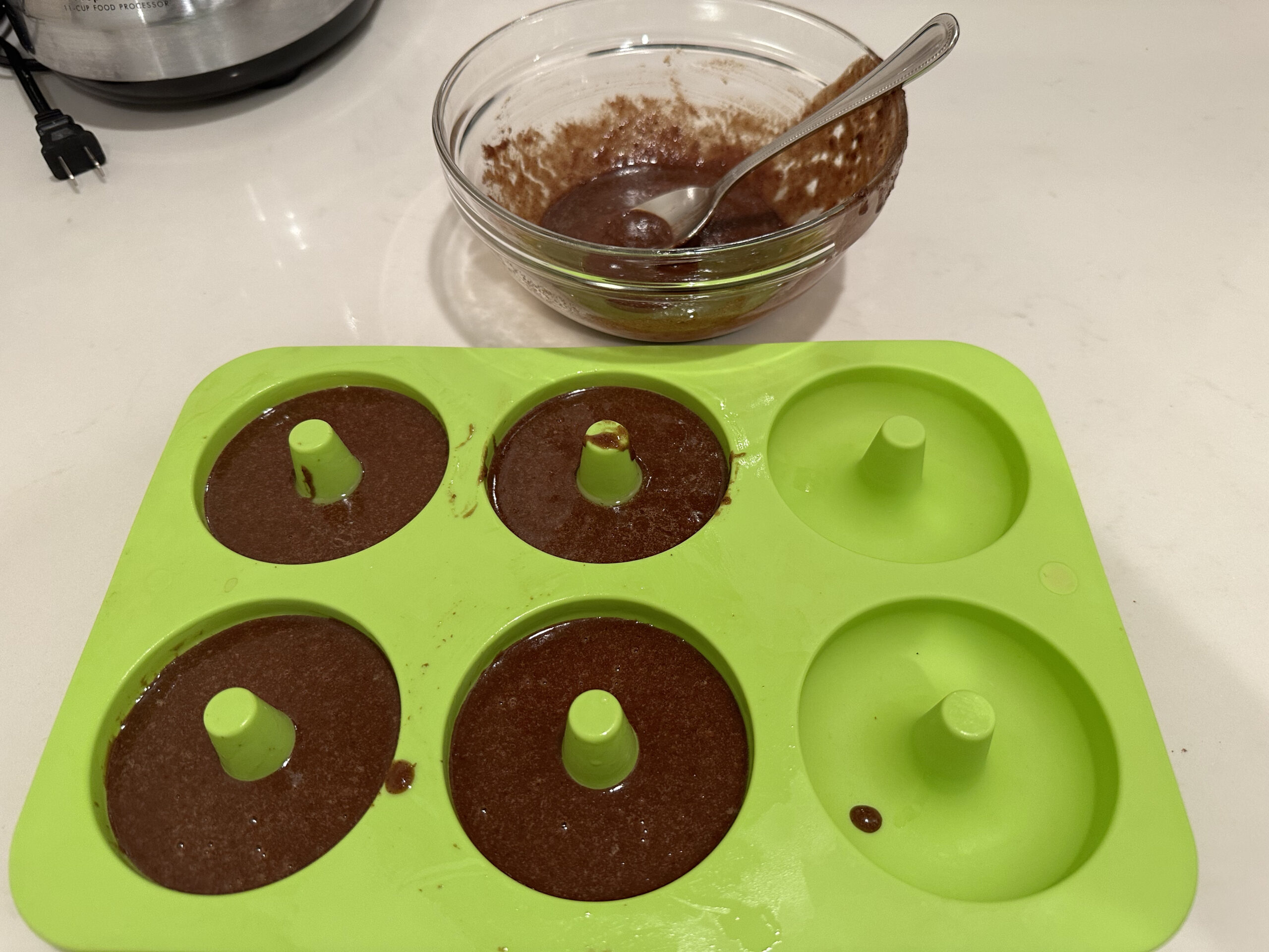 Chocolate donuts batter in mold