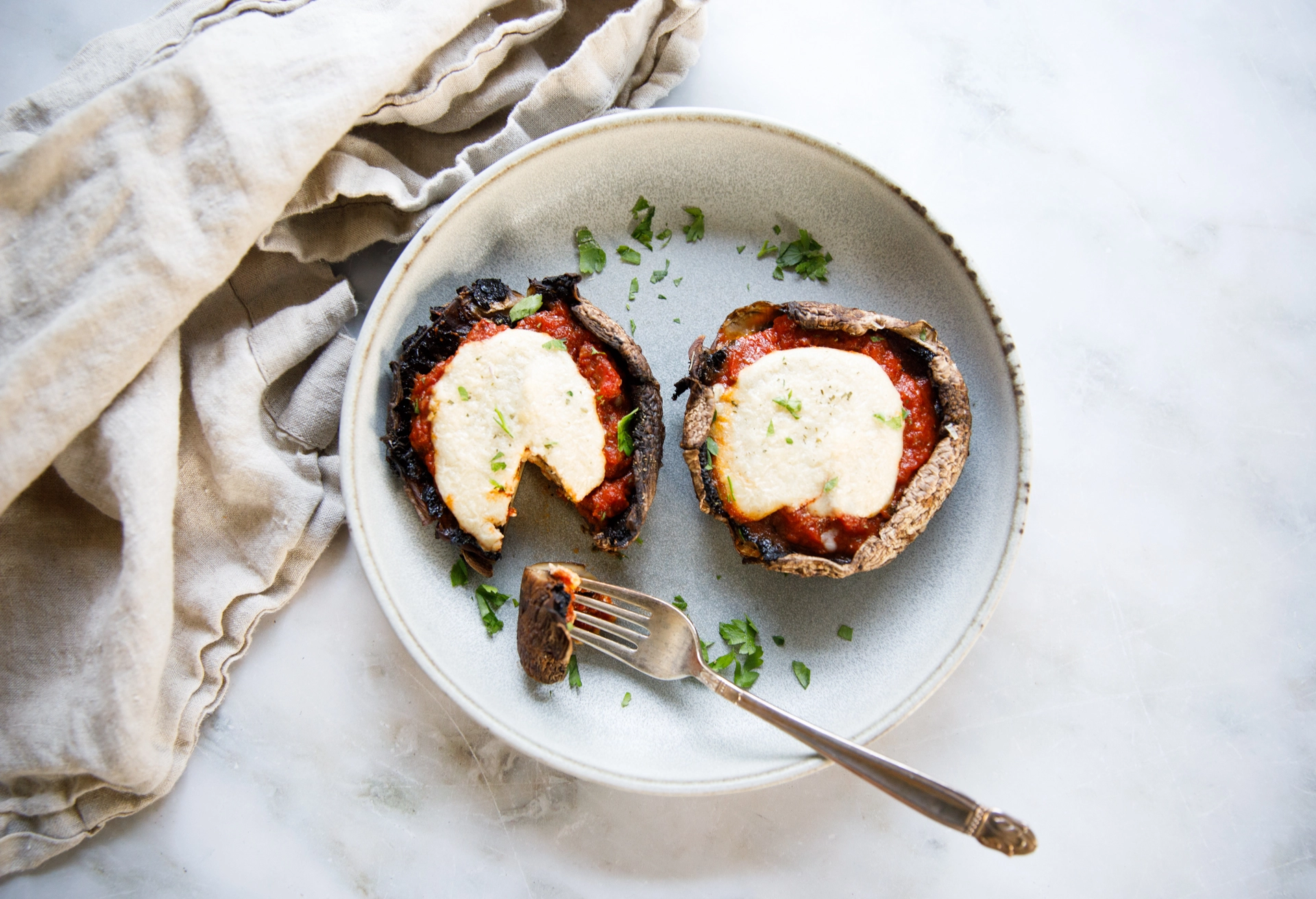 Mushroom Parmagiana on plate image