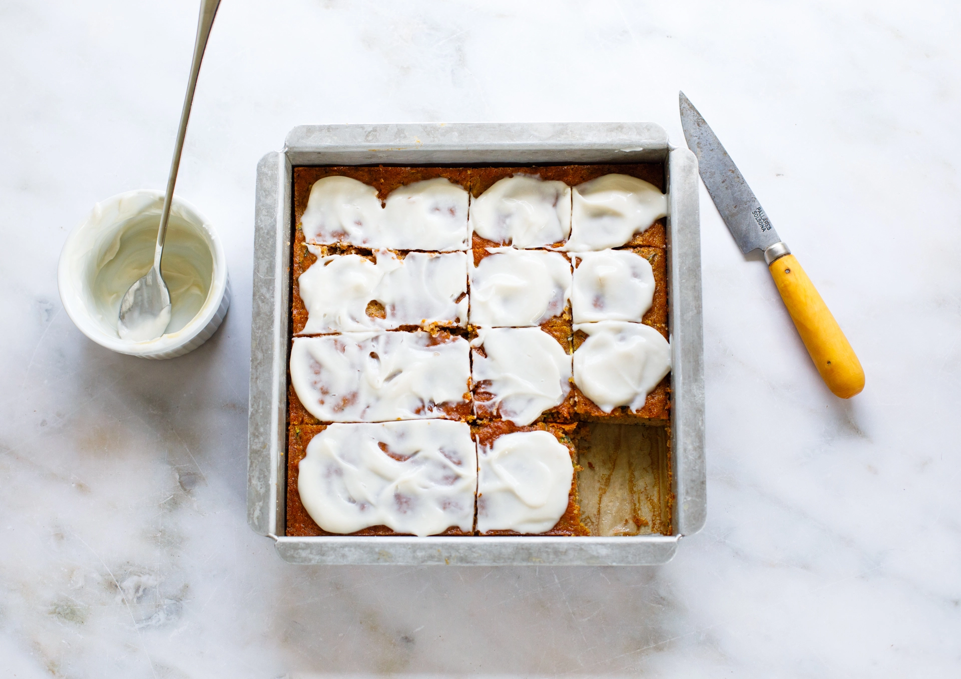 Zucchini Snack Cake overhead with vanilla icing