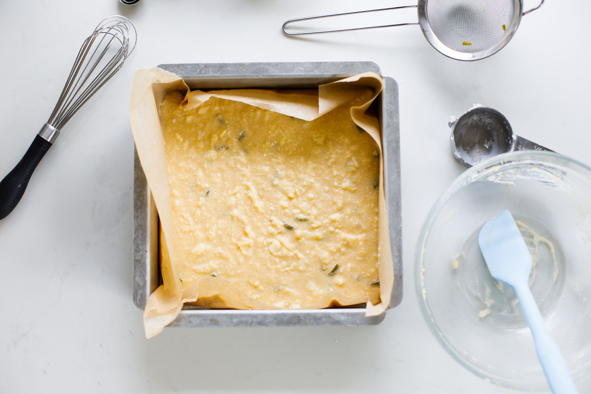Jalapeno Cheddar Corn Bread batter-in baking pan