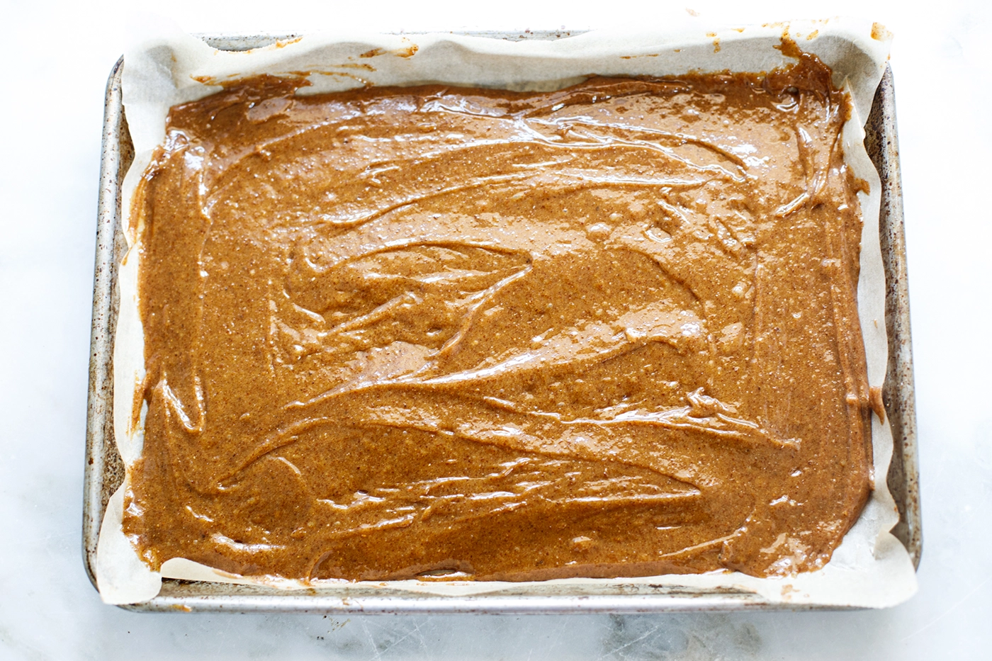 blondie batter on baking sheet