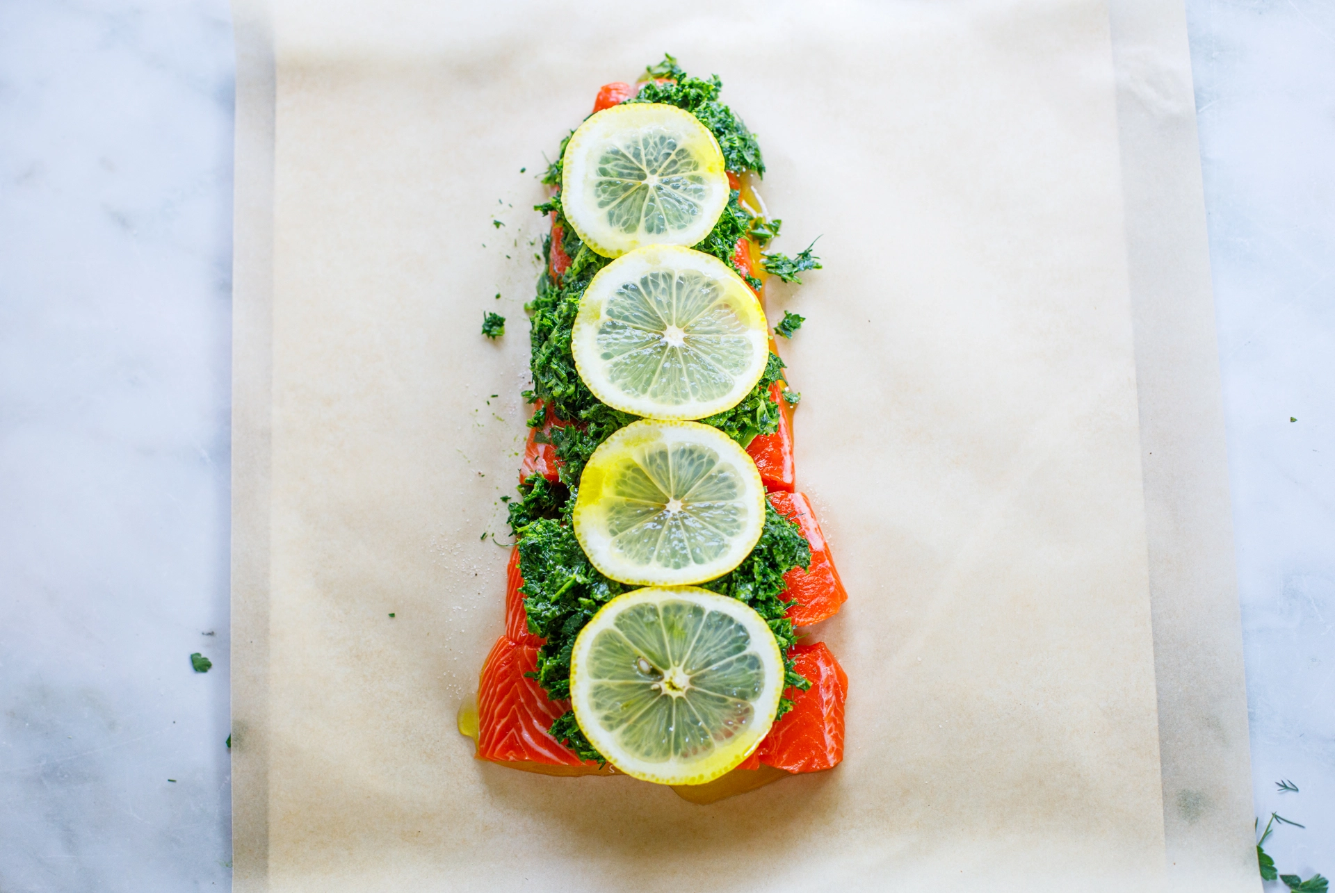 Salmon Herb Bake prepped on parchment paper