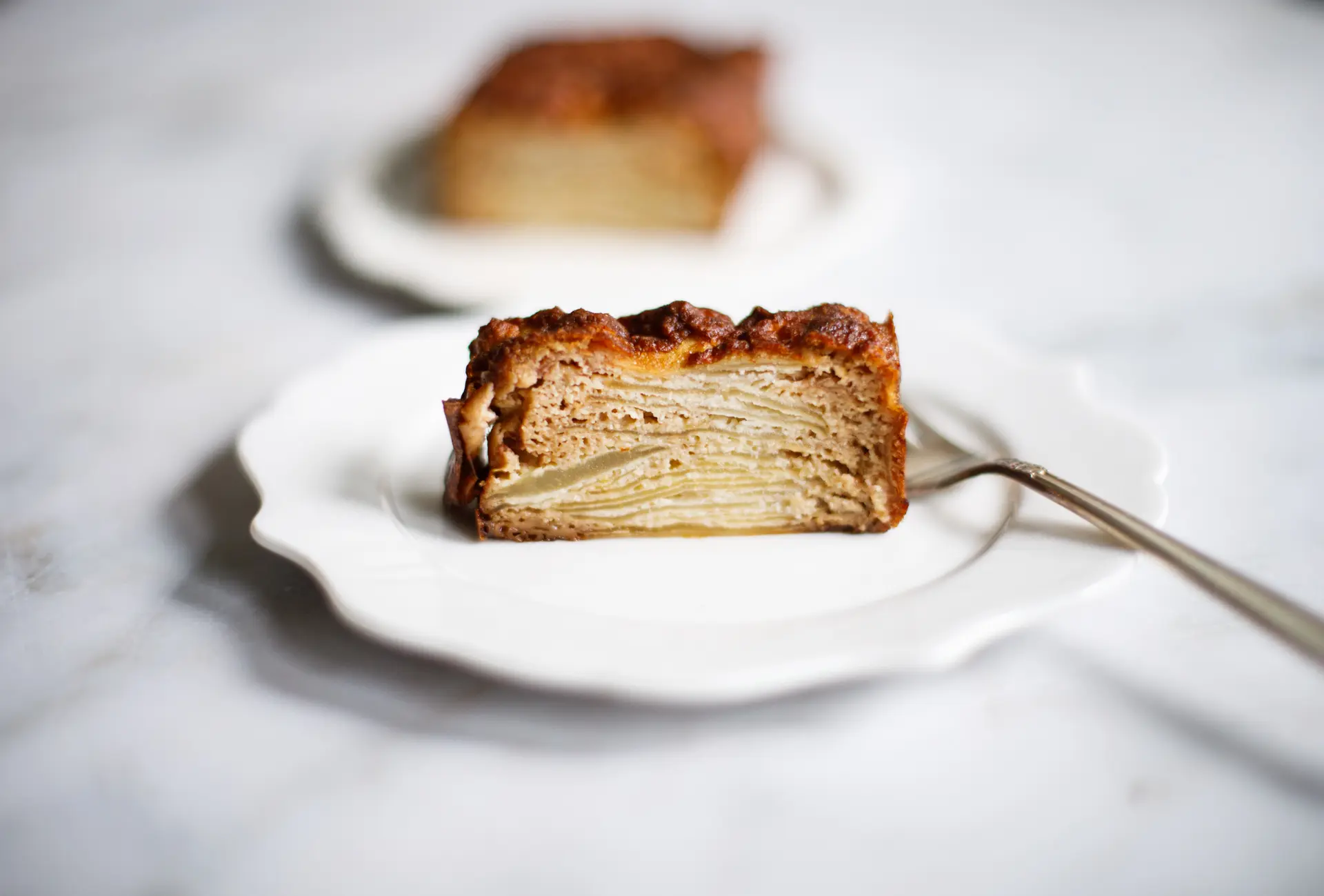 Invisible Apple Cake slice on plate