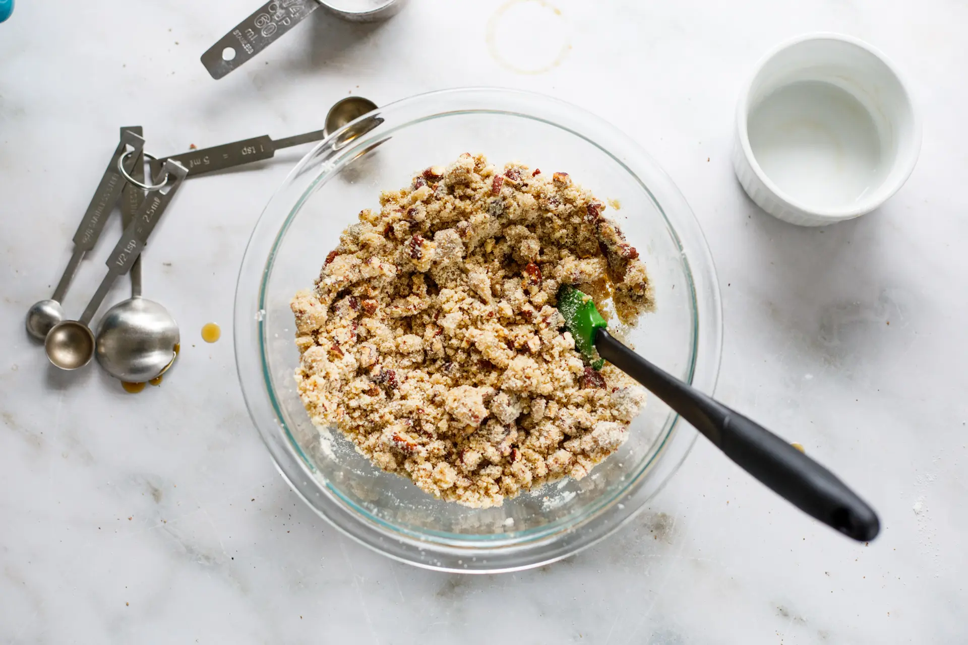 Pecan sandies dough crumbles before pressing into ball