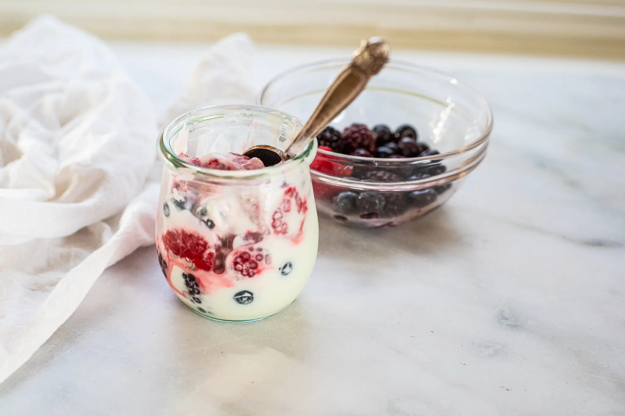coconut yogurt in jar with berries