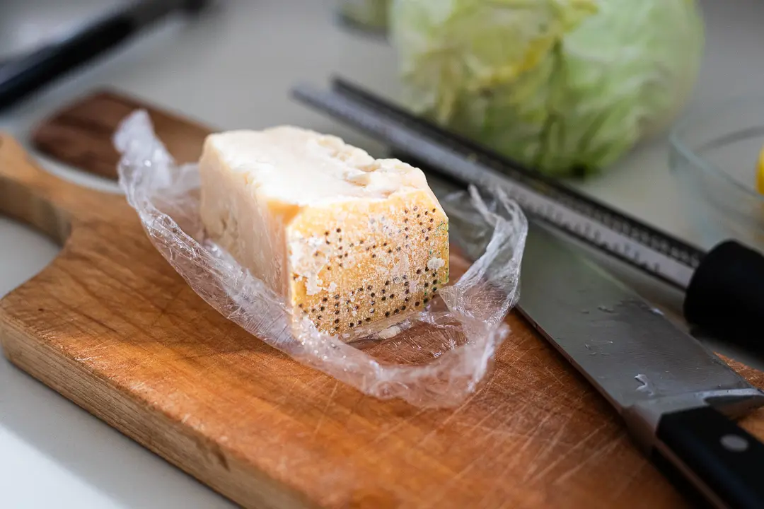 Parmesan cheese with rind showing