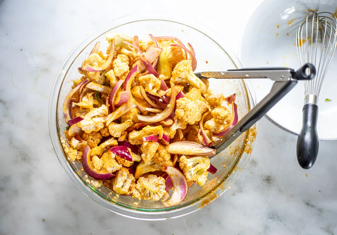 Blending cauliflower mixture in large bowl