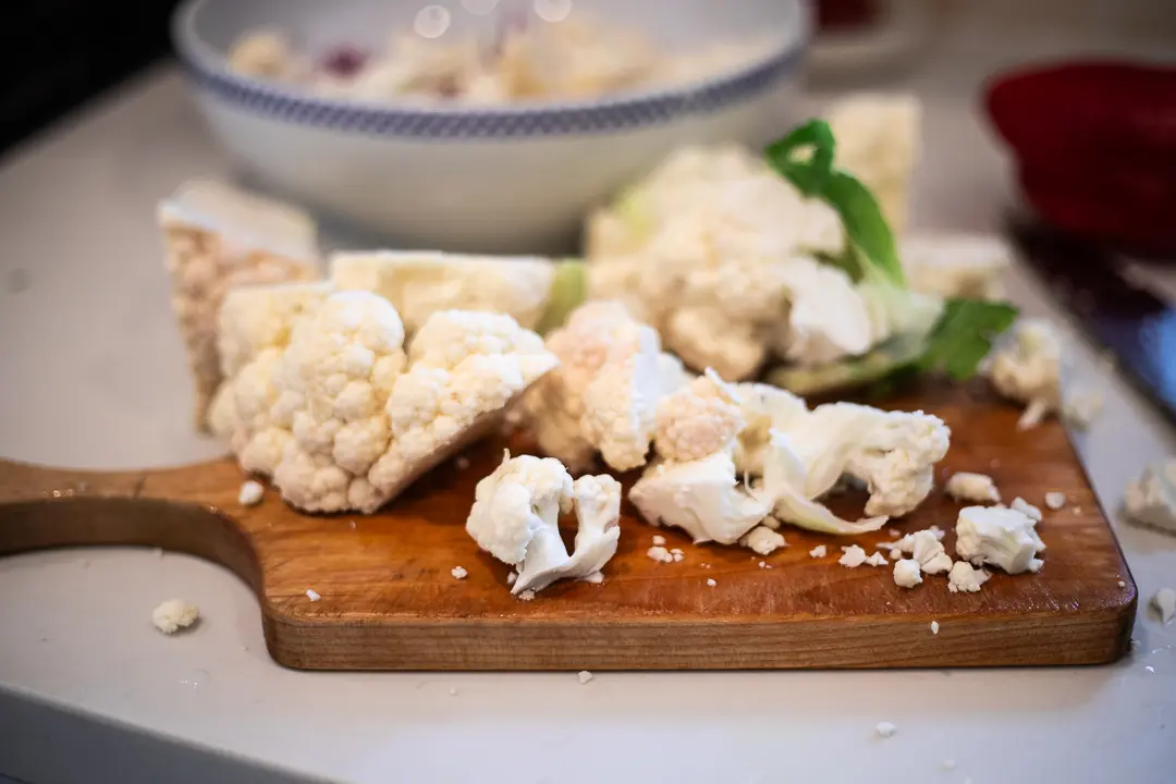 Cutting up cauliflower head